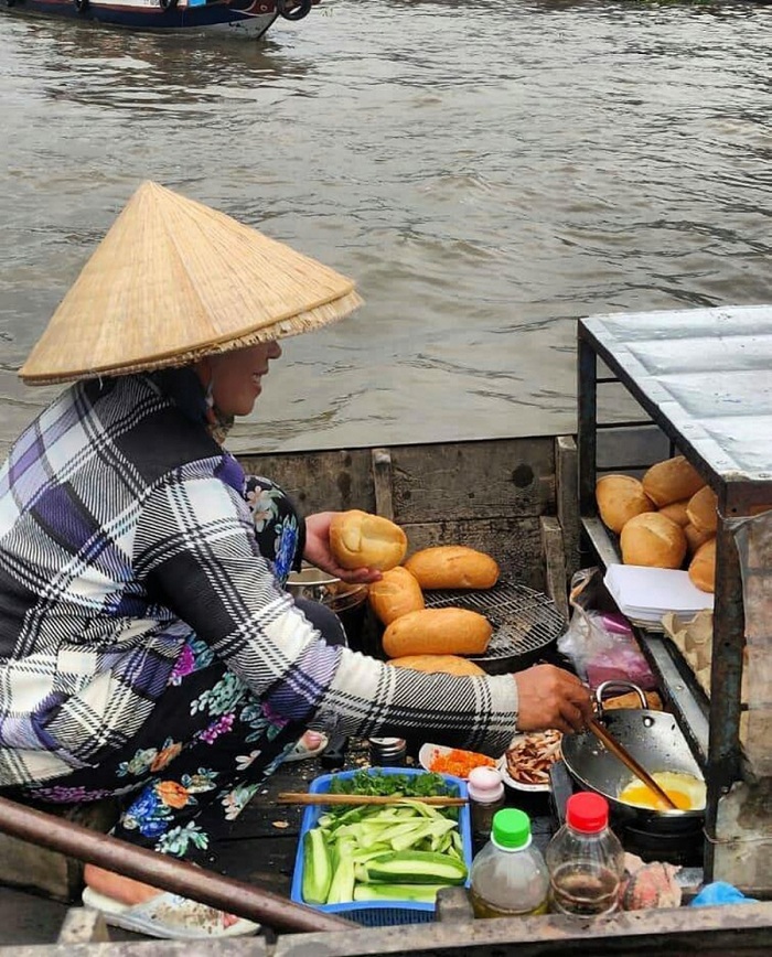 marché flottant Vietnam vie habitant